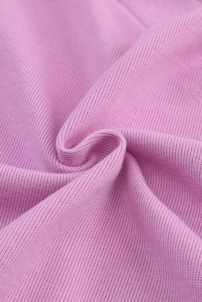 Pull violet en tricot à col en V et poignets boutonnés