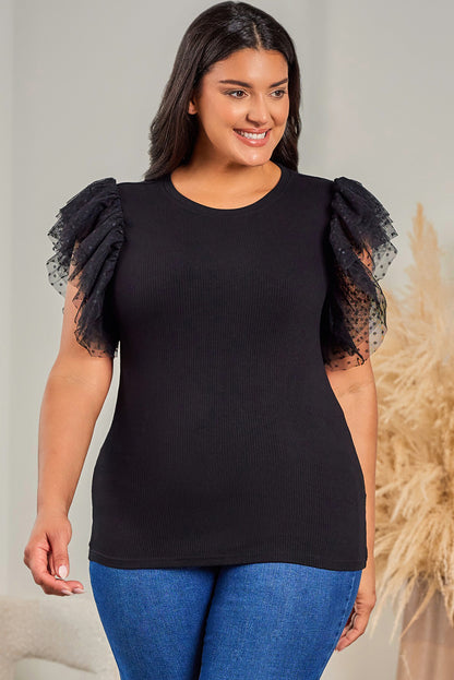 Haut en maille côtelée à volants et manches en maille à pois