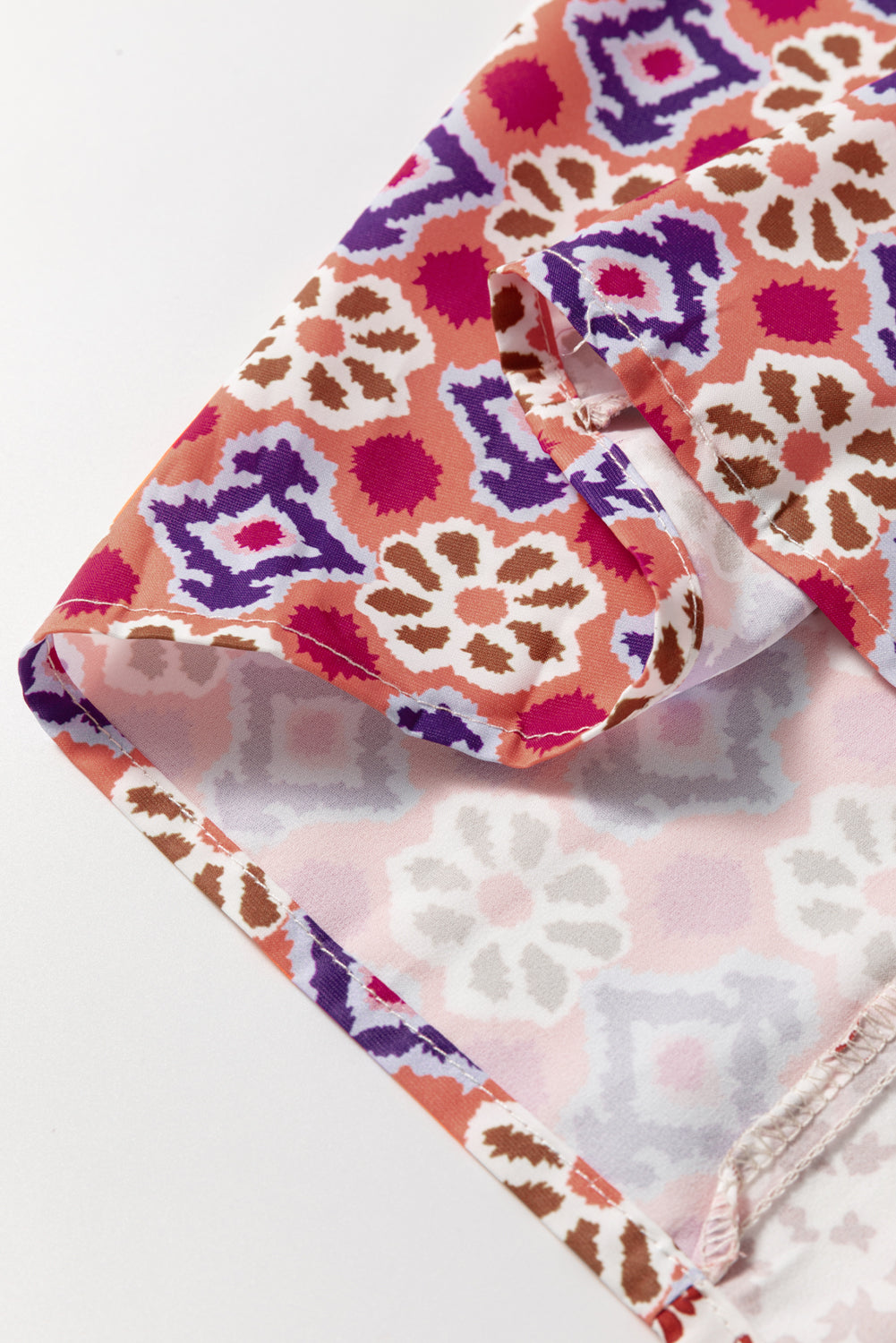 Chemisier orange à manches longues et col en V noué à imprimé floral mixte