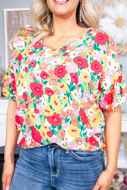 Blusa con cuello en V y manga corta con volantes y estampado floral 