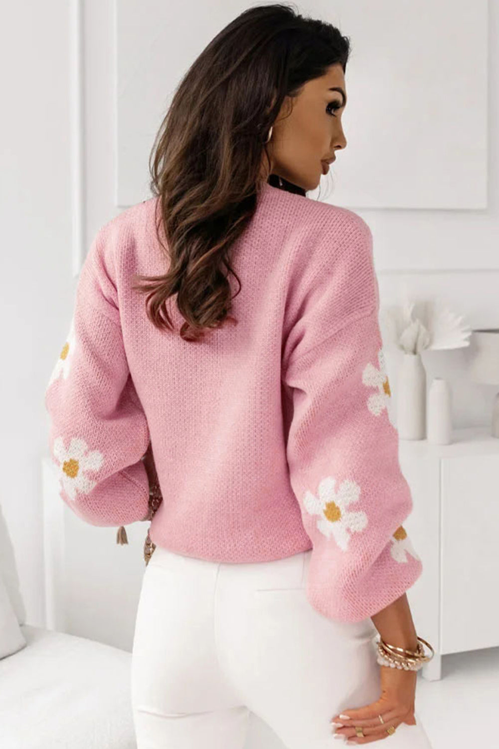 Pull à épaules tombantes et motif floral rose 