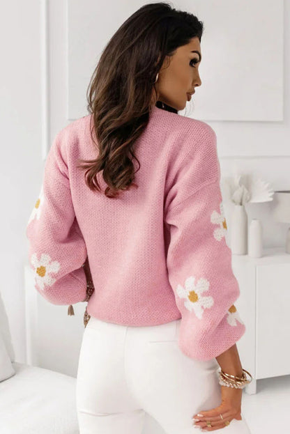 Pull à épaules tombantes et motif floral rose 