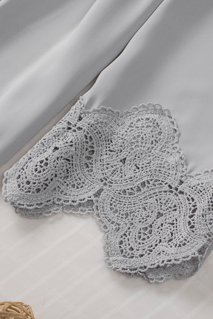 Chemisier à manches cloche et empiècements en crochet