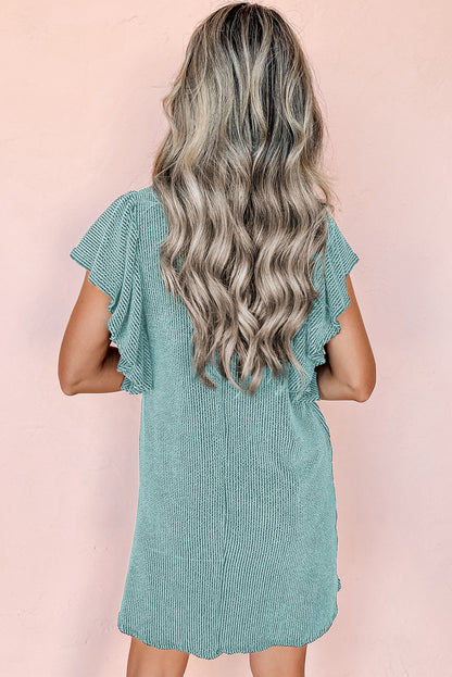 Mini-robe texturée bleue Aruba à manches flottantes et volants