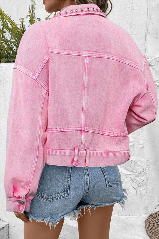 Veste en jean rose à poches cloutées et rivets 