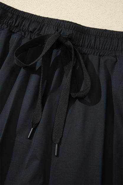 Black Plus Size Drawstring Waist Flared Tennis Skort