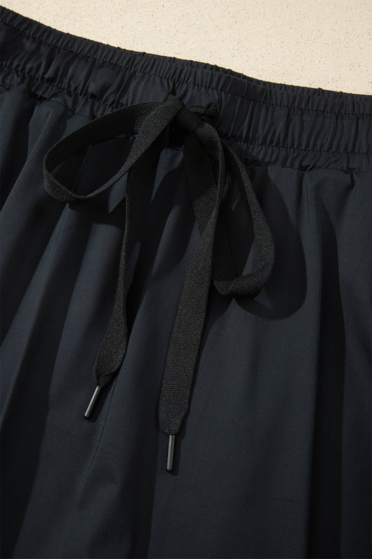 Black Plus Size Drawstring Waist Flared Tennis Skort