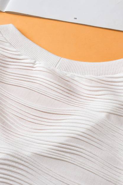Haut blanc uni texturé à manches courtes et col en V