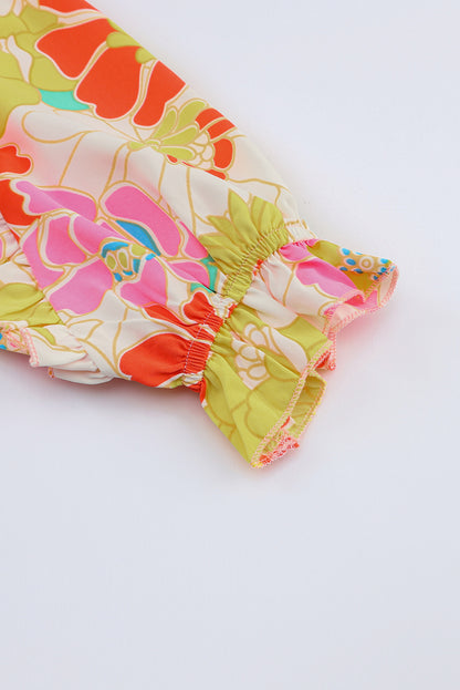 Top floral con mangas acampanadas y cuello levantado multicolor