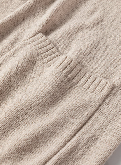 Cardigan long en maille beige ouvert sur le devant avec poches latérales