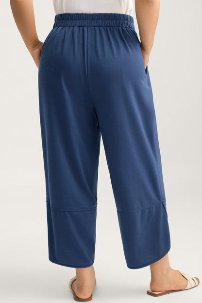 Black Plus Size Elastic Waist Asymmetrical Hem Loose Capris Pants