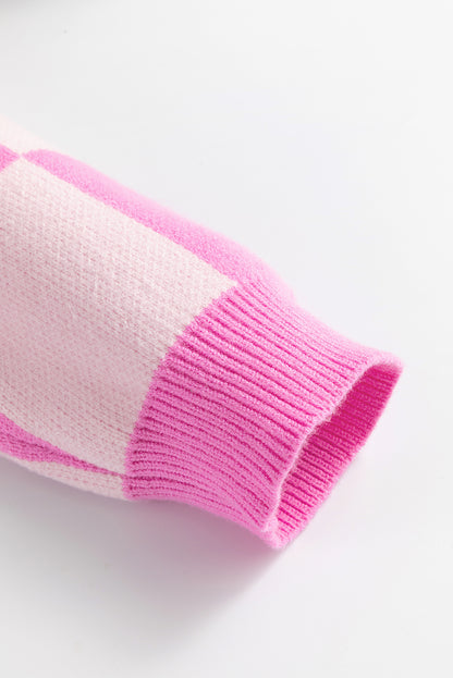 Pull à épaules tombantes et col boutonné à motif damier rose