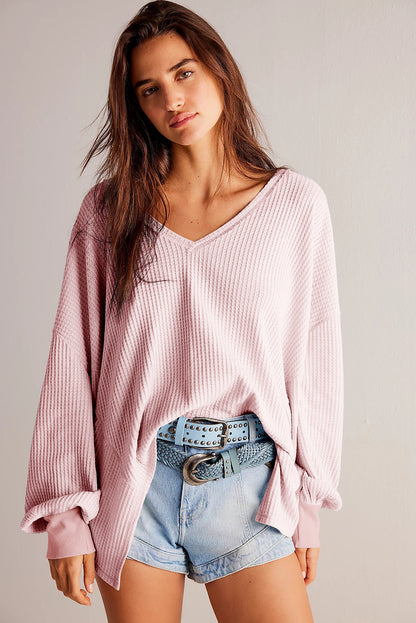 Chemisier ample rose clair gaufré à col en V et manches longues et épaules tombantes