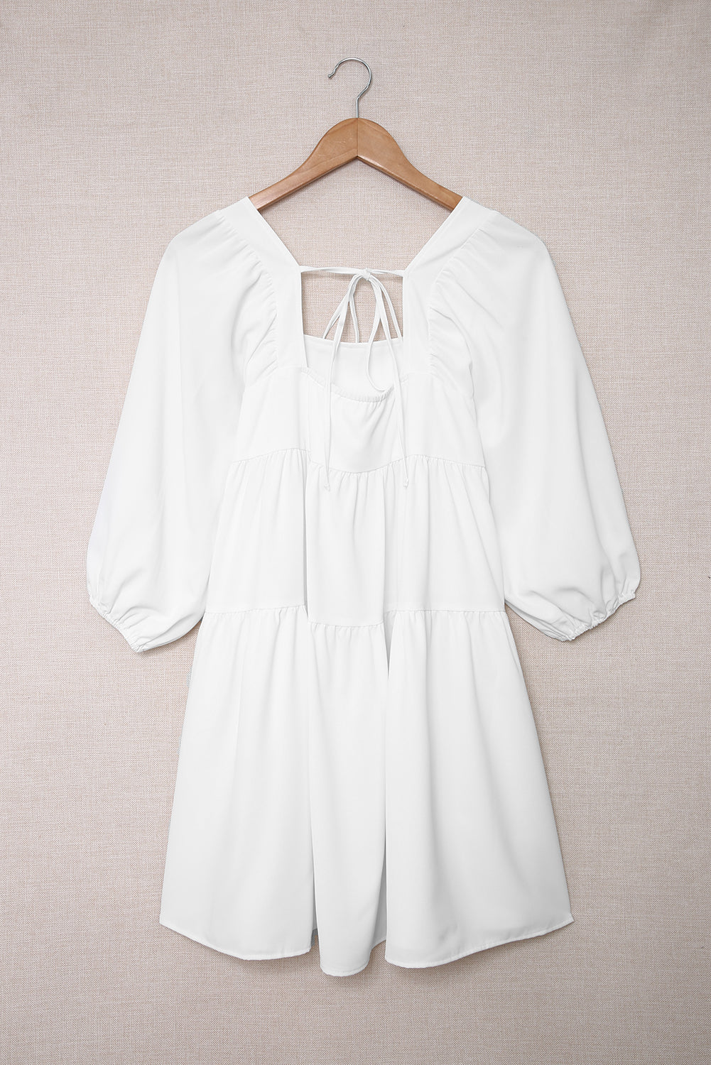 Minivestido asimétrico con cuello cuadrado y media manga 