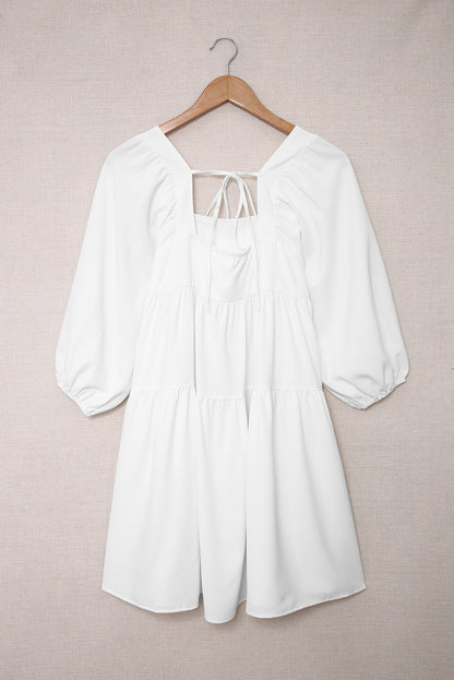 Minivestido asimétrico con cuello cuadrado y media manga 