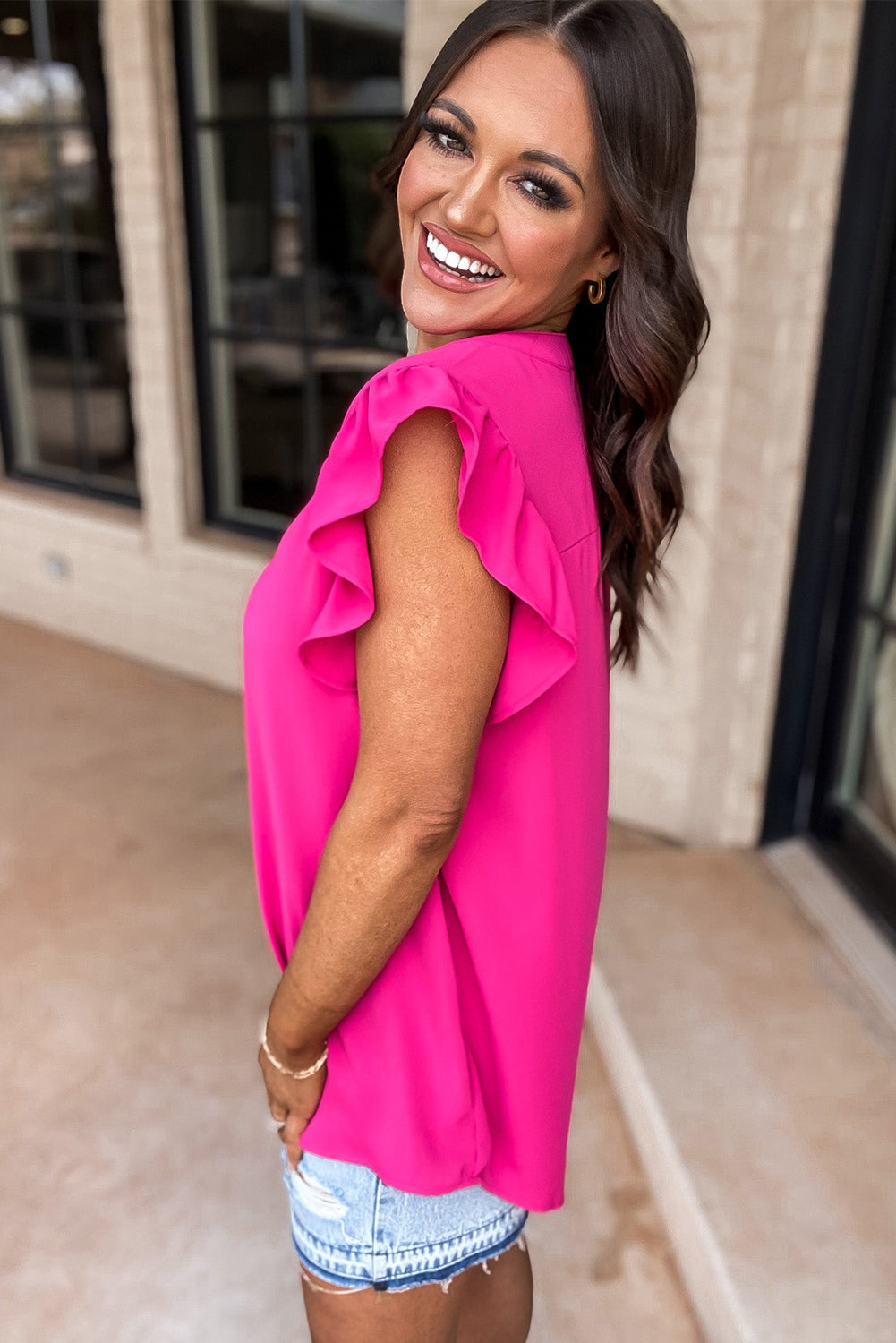 Chemisier rouge rose à col cranté et manches à volants