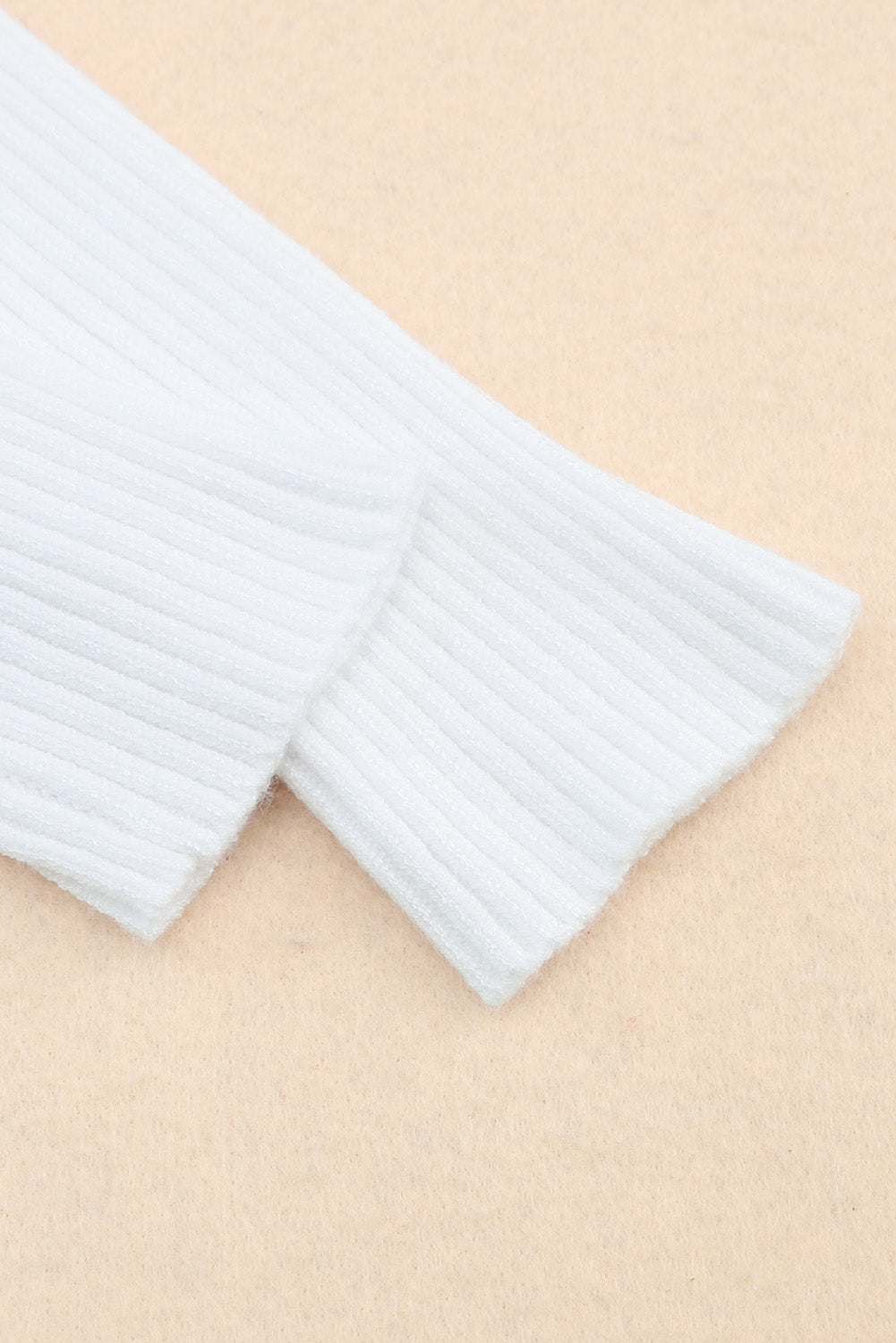 Pull col V croisé à torsades