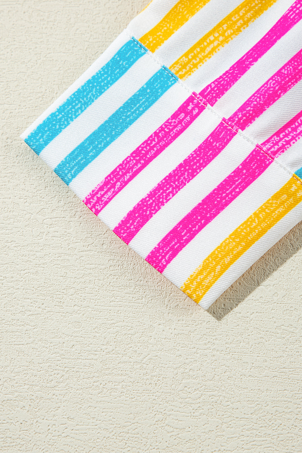 Chemise ample à rayures orange multicolores et épaules tombantes