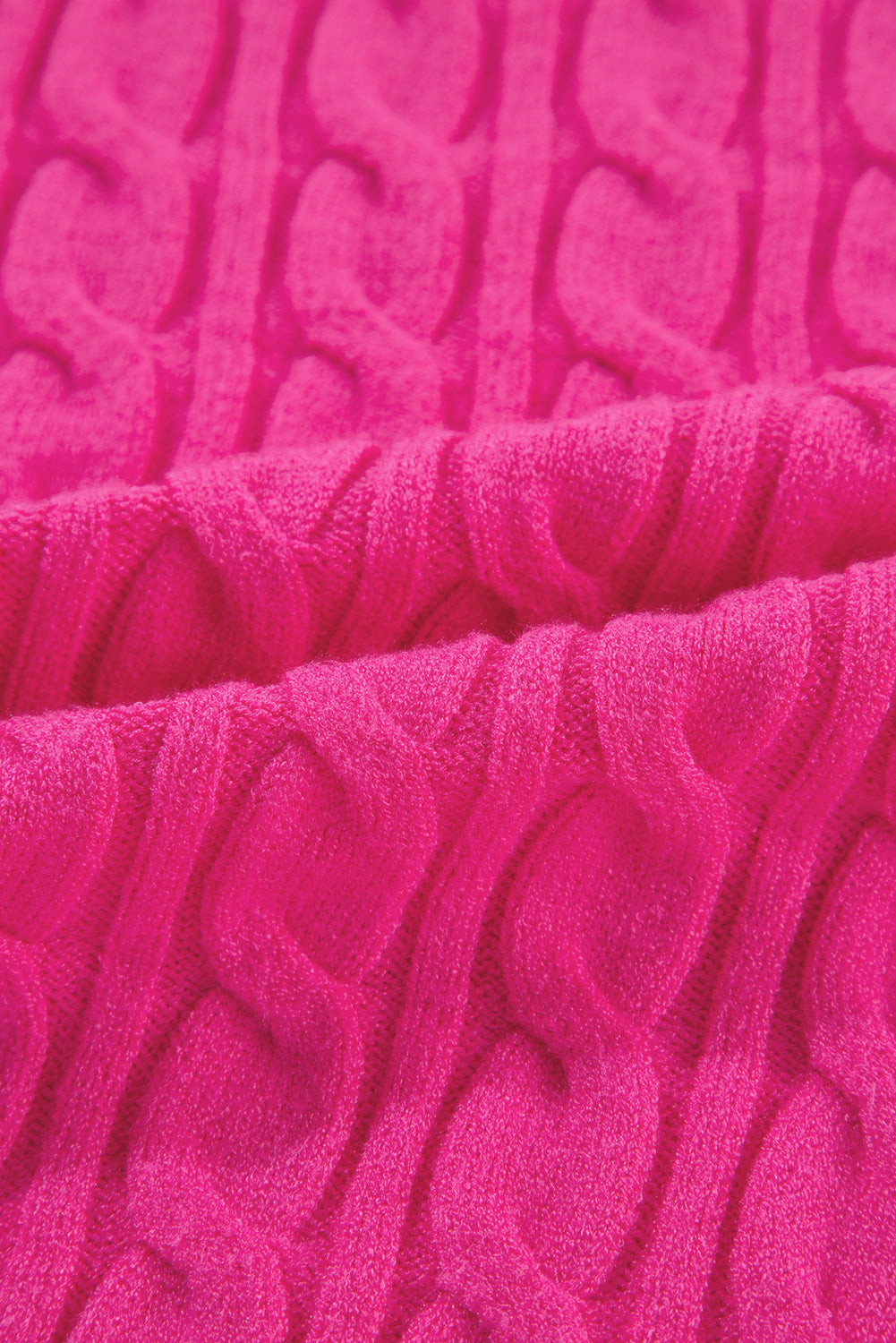 Pull à col montant et épaules tombantes en maille torsadée unie rouge rose