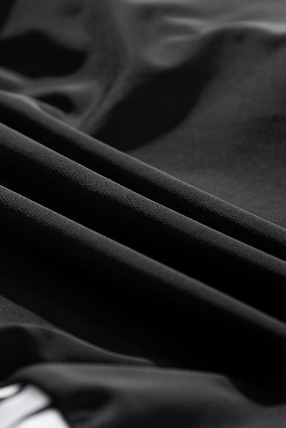 Ensemble tankini à rayures noires et cordon de serrage latéral