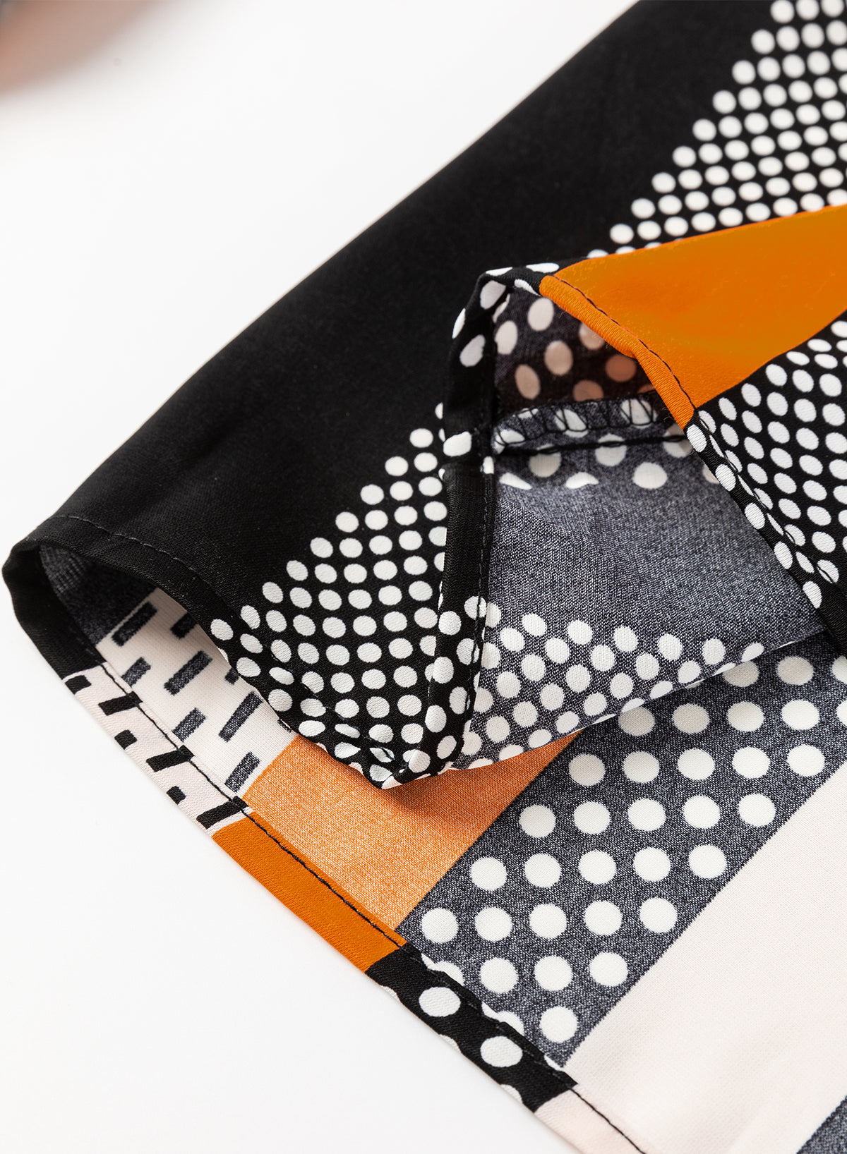 Chemisier orange à imprimé géométrique et col en V cranté