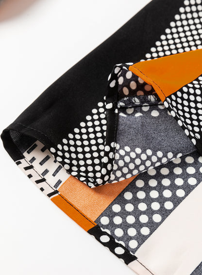 Chemisier orange à imprimé géométrique et col en V cranté