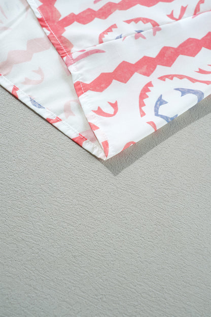 Chemisier à manches bouffantes et col poète smocké imprimé vintage fleur du désert