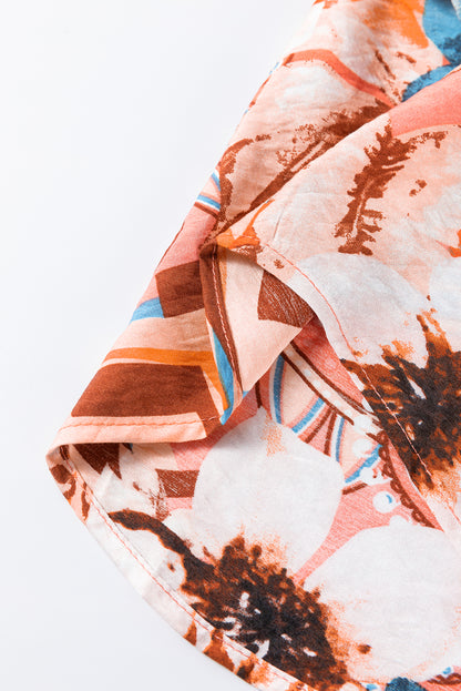 Chemise ample boutonnée à imprimé floral orange et poignets froncés