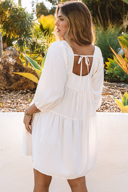 Minivestido asimétrico con cuello cuadrado y media manga 