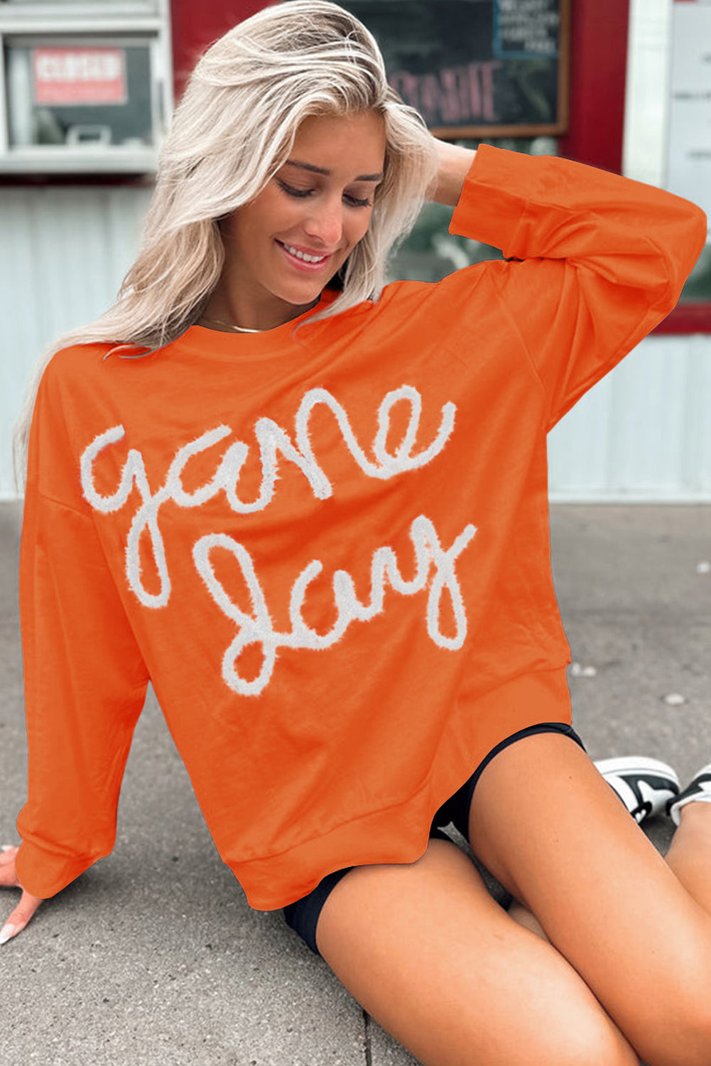 Sweat-shirt graphique à épaules tombantes et guirlandes orange roux pour le jour du match
