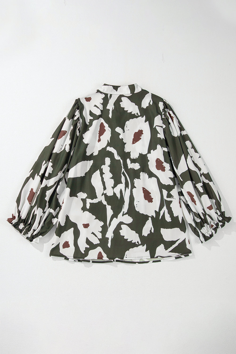 Chemisier à manches bouffantes et demi-bouton à imprimé floral abstrait trèfle à quatre feuilles