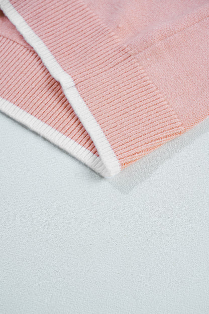 Pull à manches longues rose clair à volants et bordure côtelée avec nœud papillon