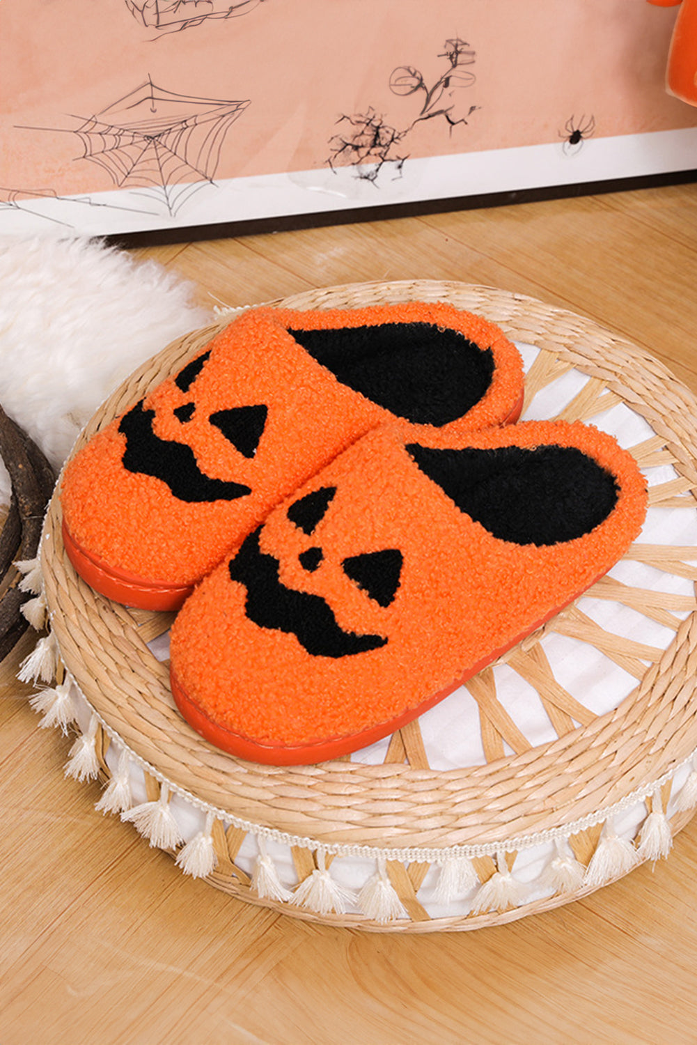 Chaussons en peluche orange à motif citrouille d'Halloween