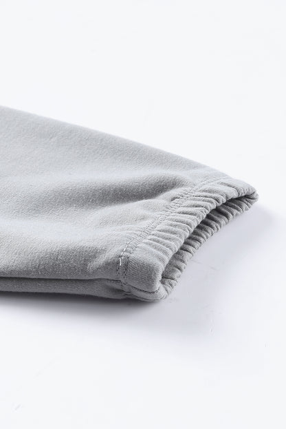 Haut ample à col large et manches chauve-souris 