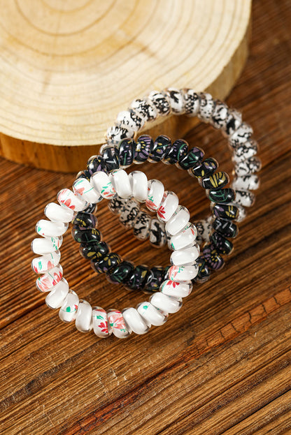 Coletero con cordón para teléfono floral negro