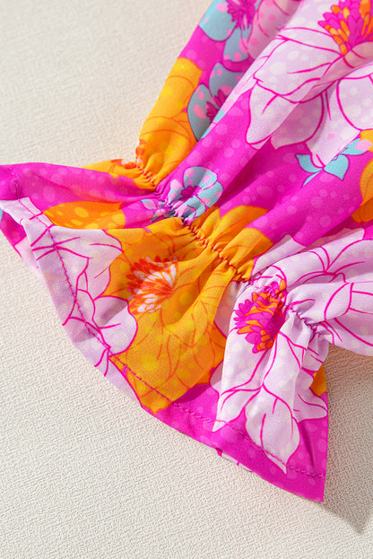 Chemisier à imprimé floral rose, manches volantées et col cranté