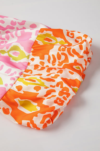 Chemisier à manches bouffantes et col fendu, imprimé léopard orange