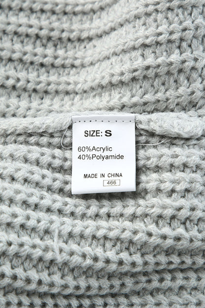 Pull oversize boutonné à épaules tombantes 