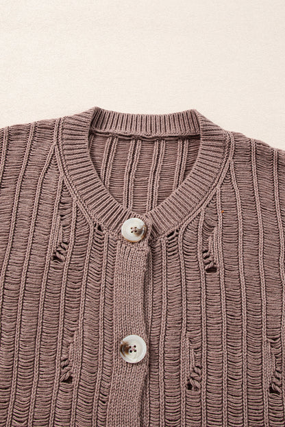 Cardigan boutonné en tricot texturé découpé en chèvre
