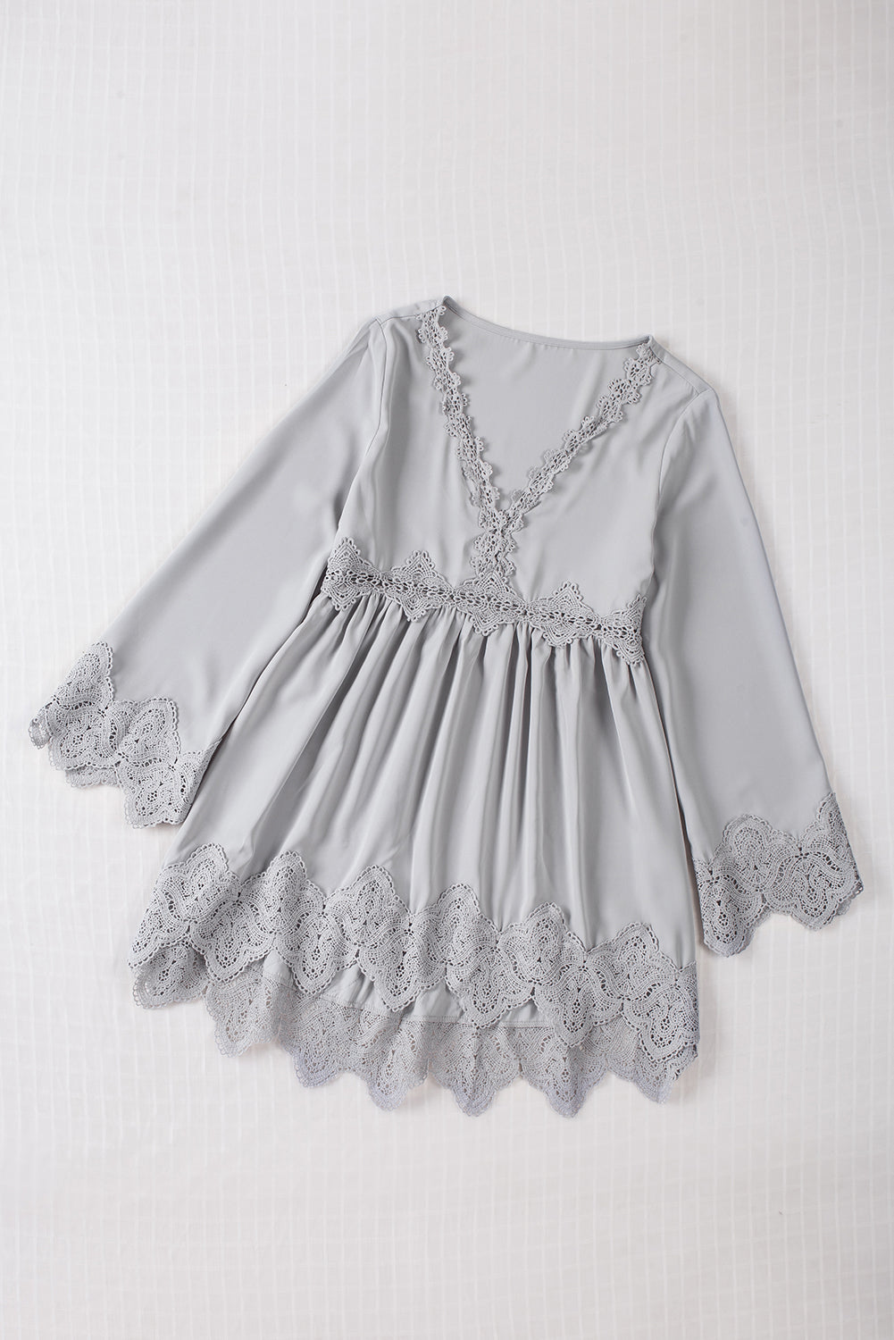 Chemisier à manches cloche et empiècements en crochet