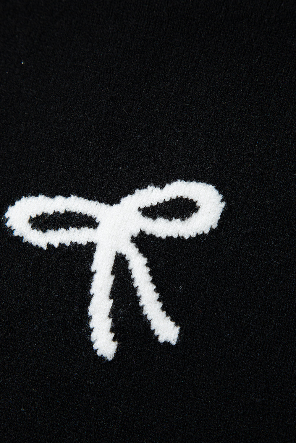 T-shirt noir à imprimé nœud et ourlet festonné