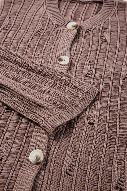 Cardigan boutonné en tricot texturé découpé en chèvre