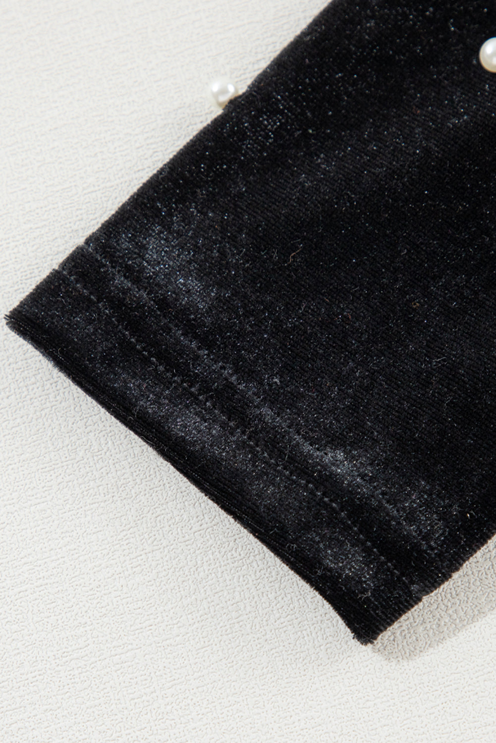 Body à manches longues et col en V en velours noir orné de perles