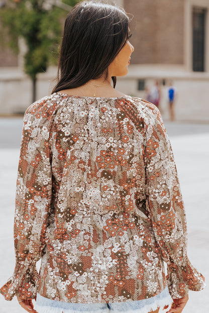 Blusa con botones y cuello en V con estampado floral 