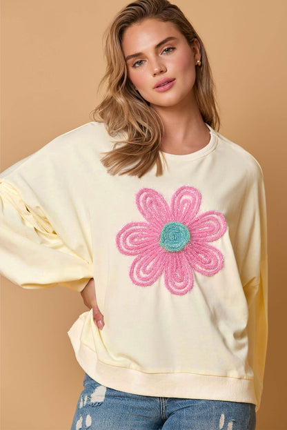 Sweat-shirt beige à manches bouffantes et fleurs en guirlandes