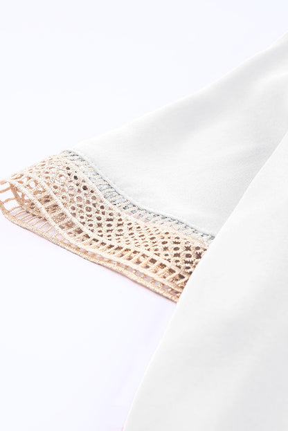 Chemisier à manches courtes et col en V avec bordure en dentelle