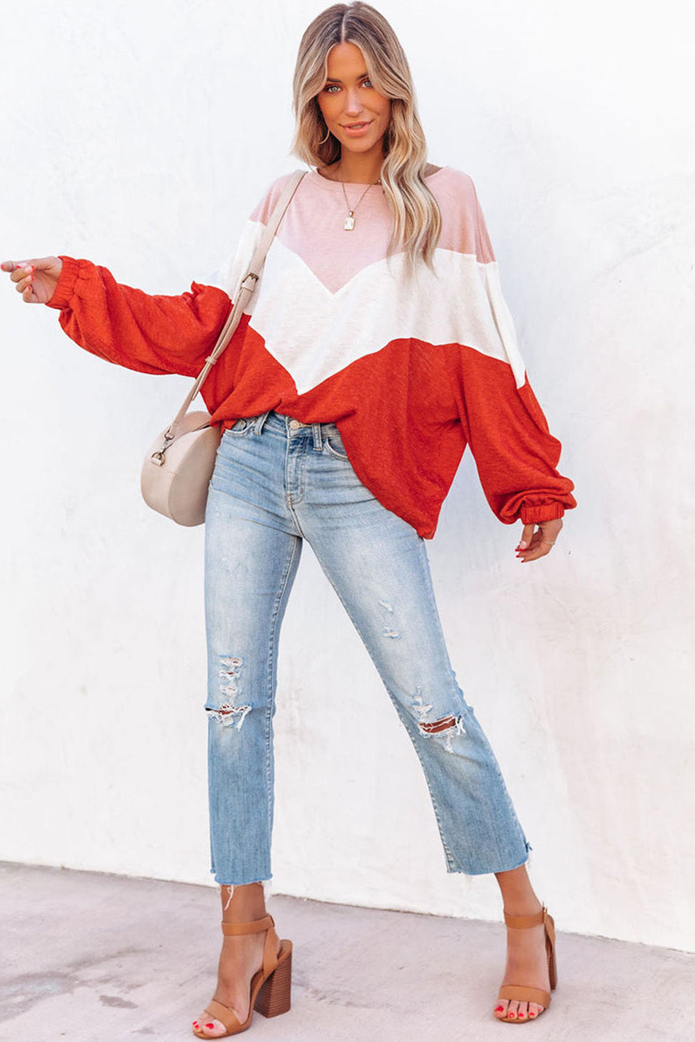 Haut en tricot orange surdimensionné à chevrons