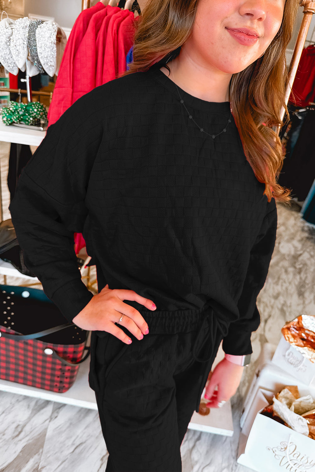 Ensemble pull-over et pantalon texturé à carreaux noir