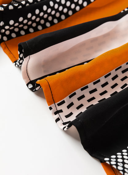 Chemisier orange à imprimé géométrique et col en V cranté