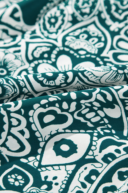 Robe grande taille verte à fleurs et manches à volants, col fendu